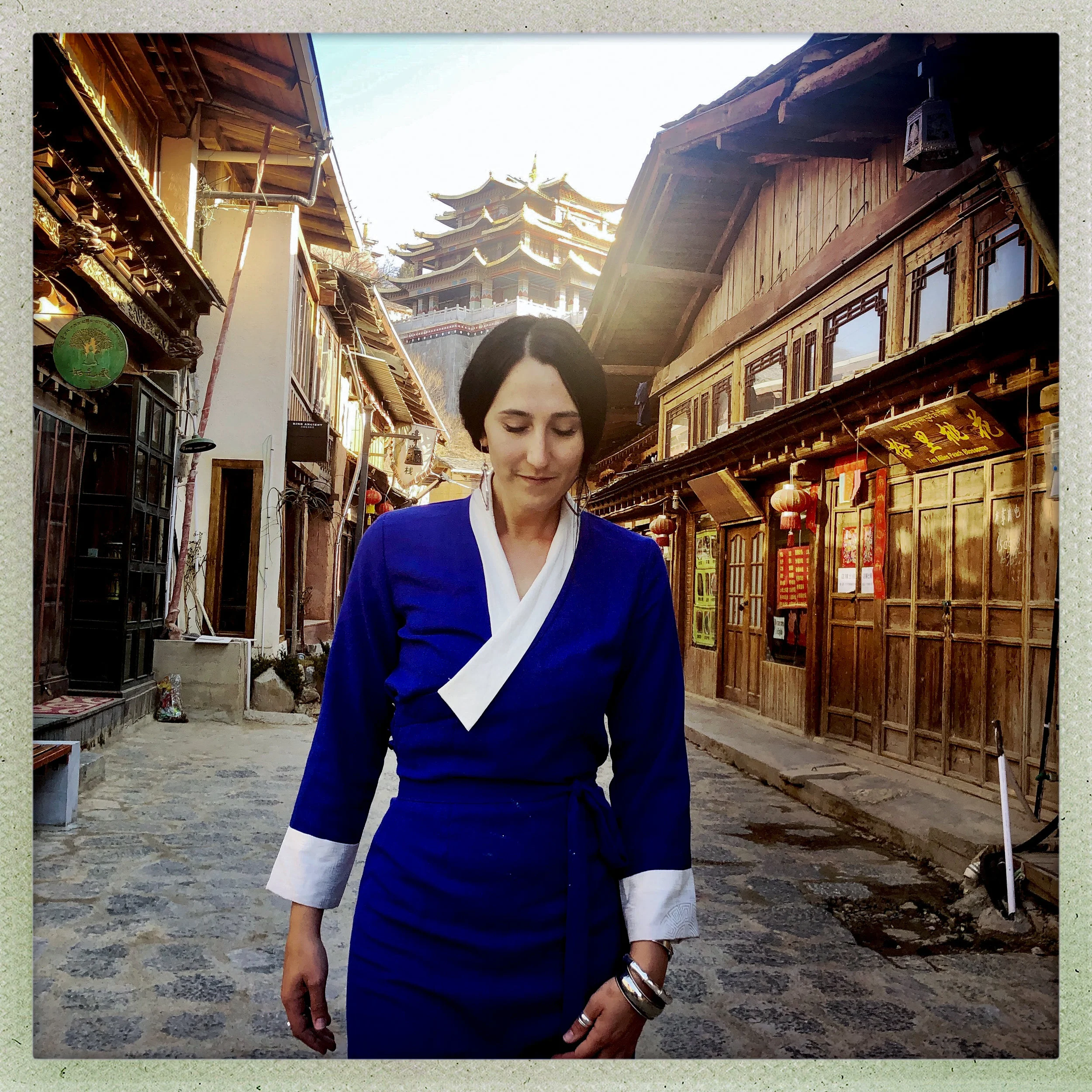 Jenna wearing a traditional Tibetan chupa dress in Azure Blue. Photo collaboration with Douglas Beasley