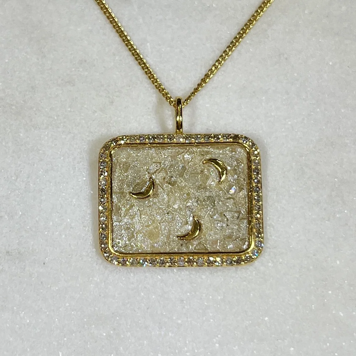 SGulatiCrescentMoonRectPendantNeckB.jpg