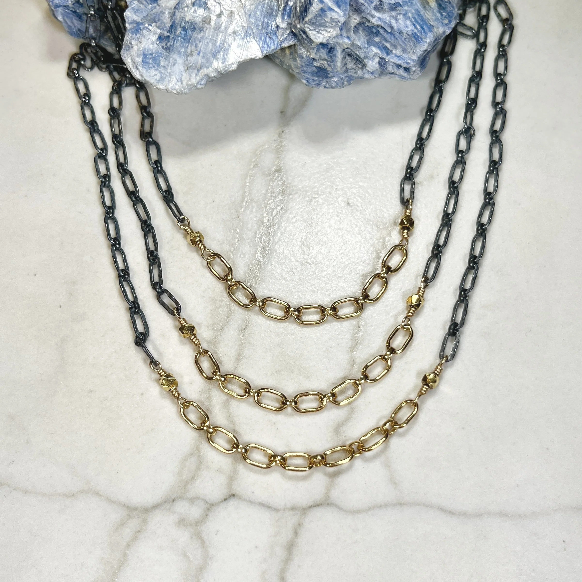 DKellinTripleChainNeck.jpg