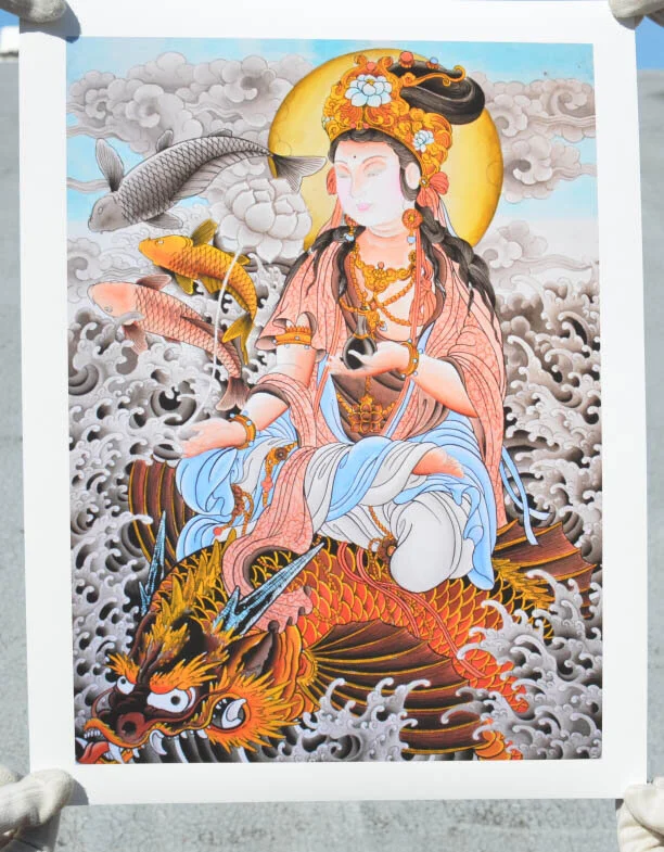 Kwan yin Holding E.jpg