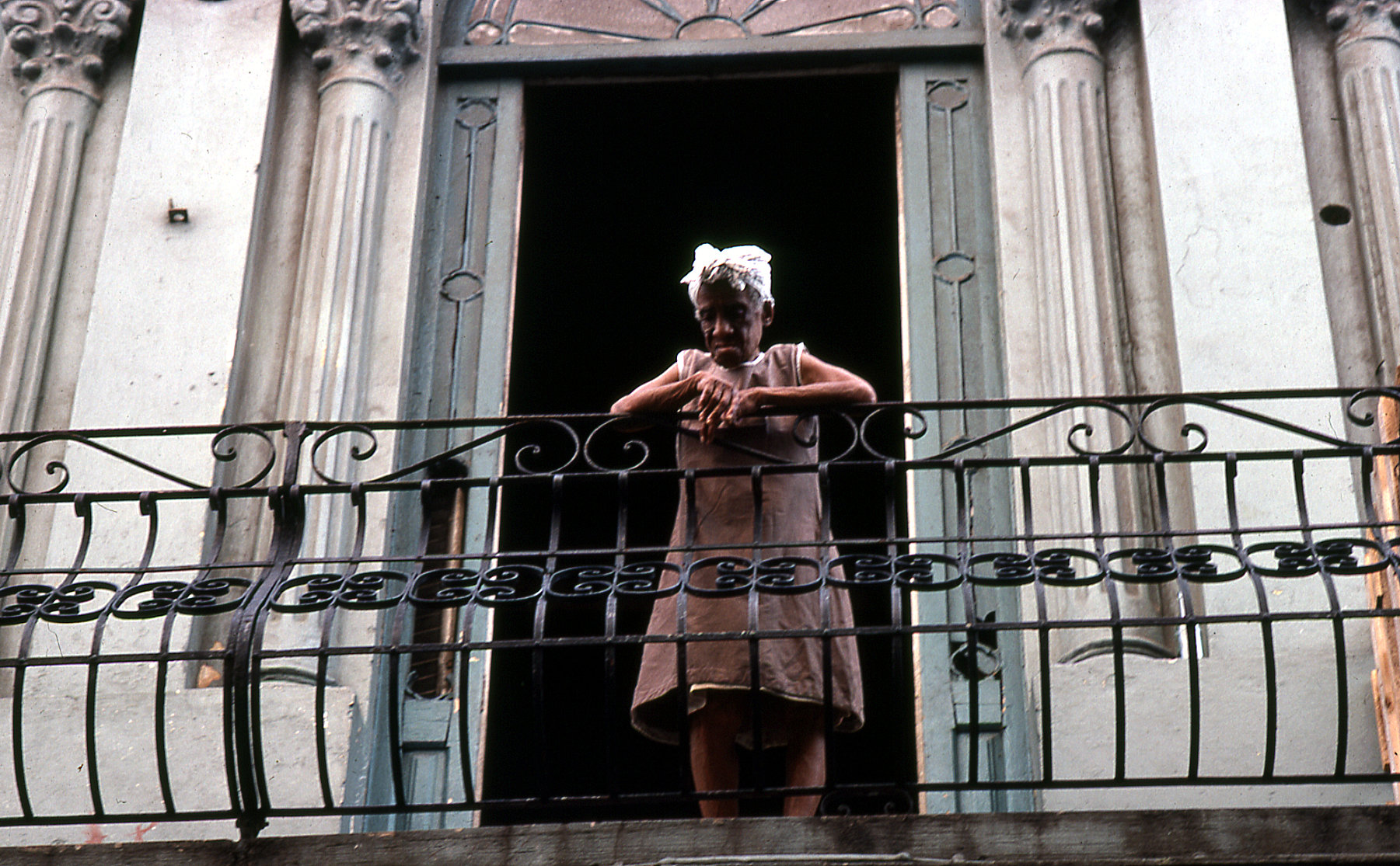 Cuban woman on balcony