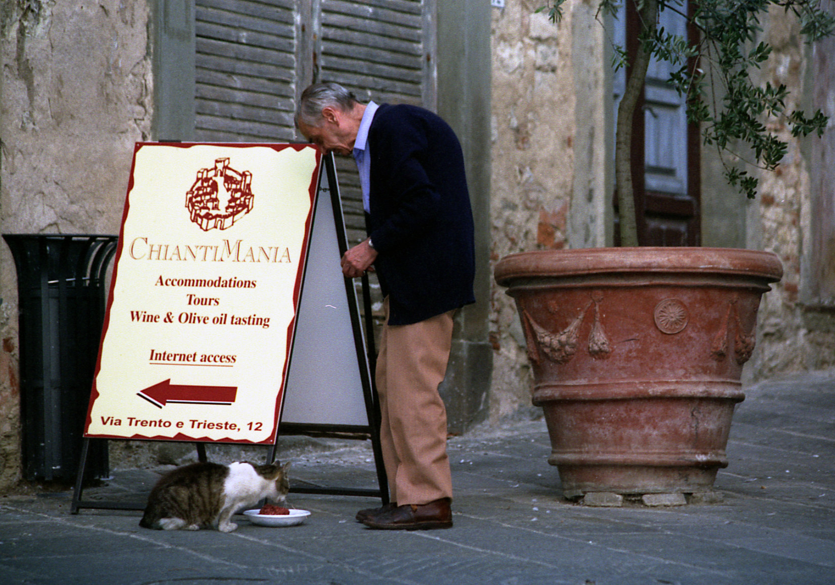 man and cat