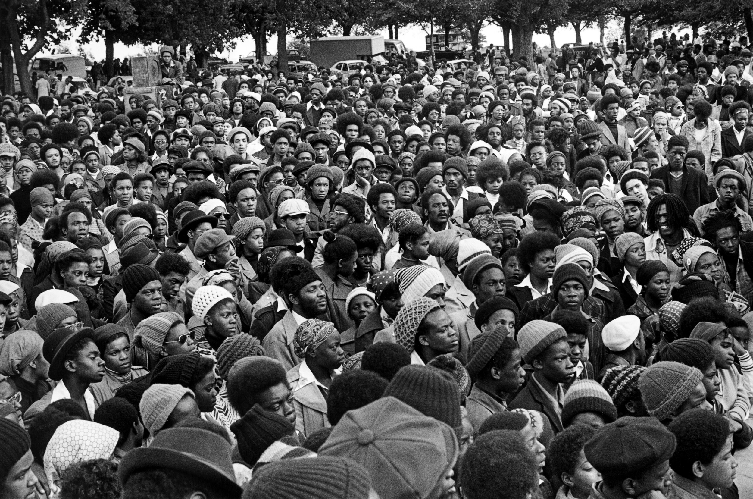 African Liberation Day, Handsworth Park. Crowd listens to speakers, from Africa, America the Caribbean bring news and information of the black Diaspora. 1977..jpg