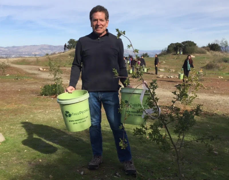 David, a board member of TreePeople, out with our group restoring trees. 