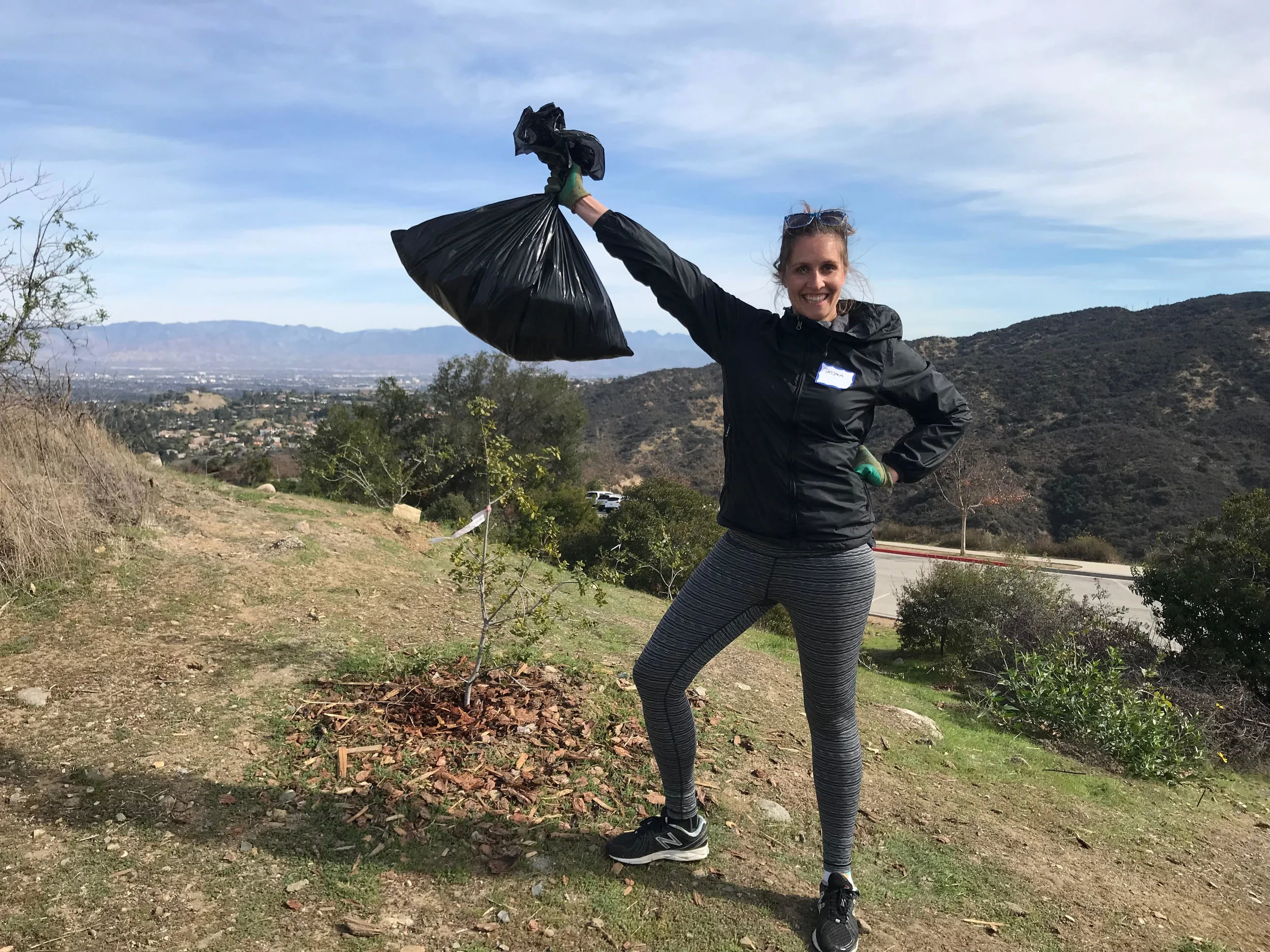 Tatjana did the dirty work and picked up all the trash in the surrounding landscape. 