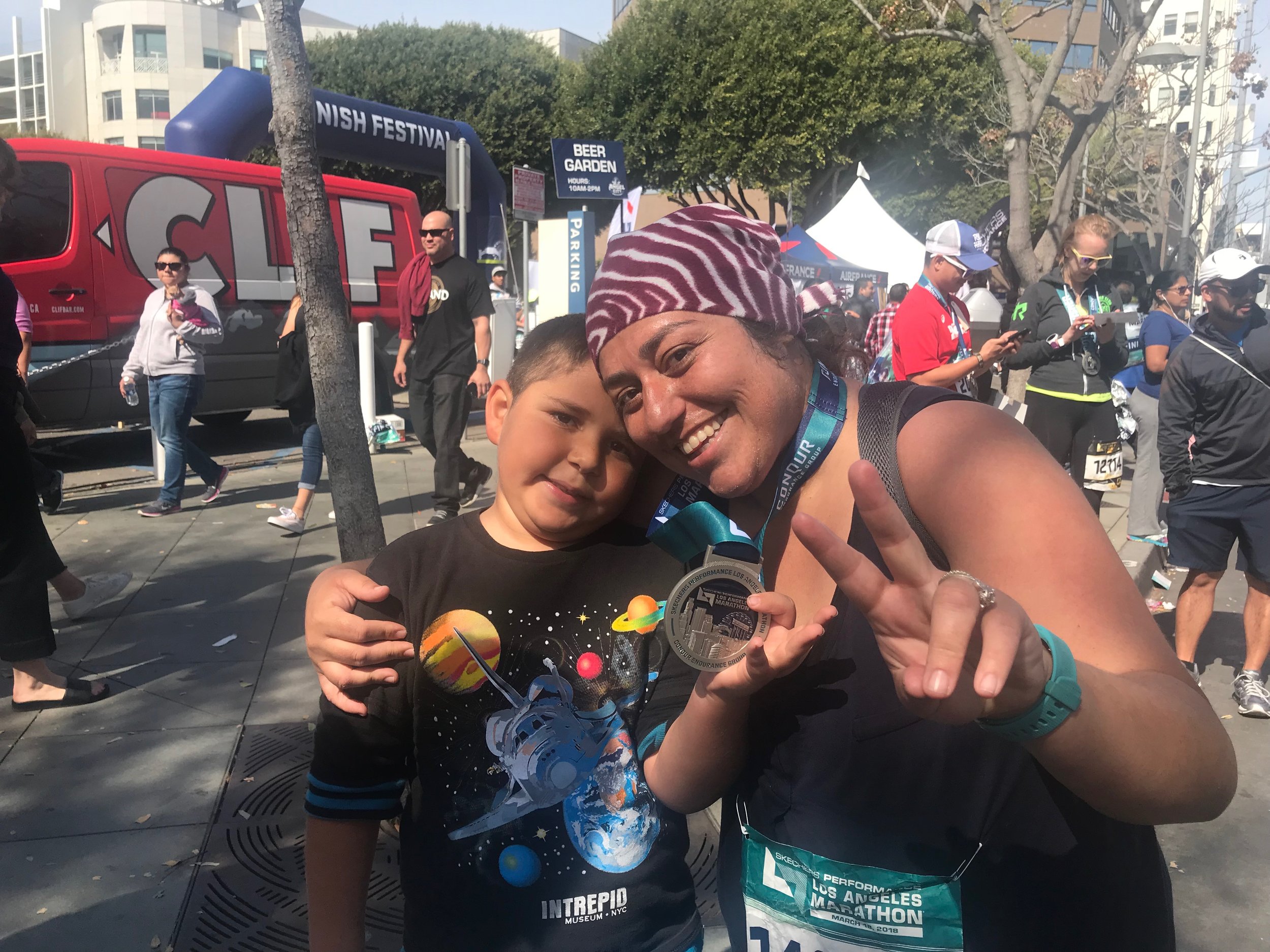 My sister and her sun showing off her completion medal. 