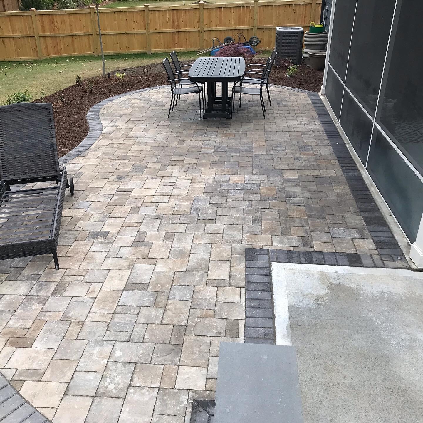 This is the second patio in Canterbury subdivision in Durham, NC we&rsquo;ve installed. We used #belgard Lafitt paver in Hatteras color as the field with Holland Stone in Slate color as the Border, installed #inlite recessed lights in the pavers to g