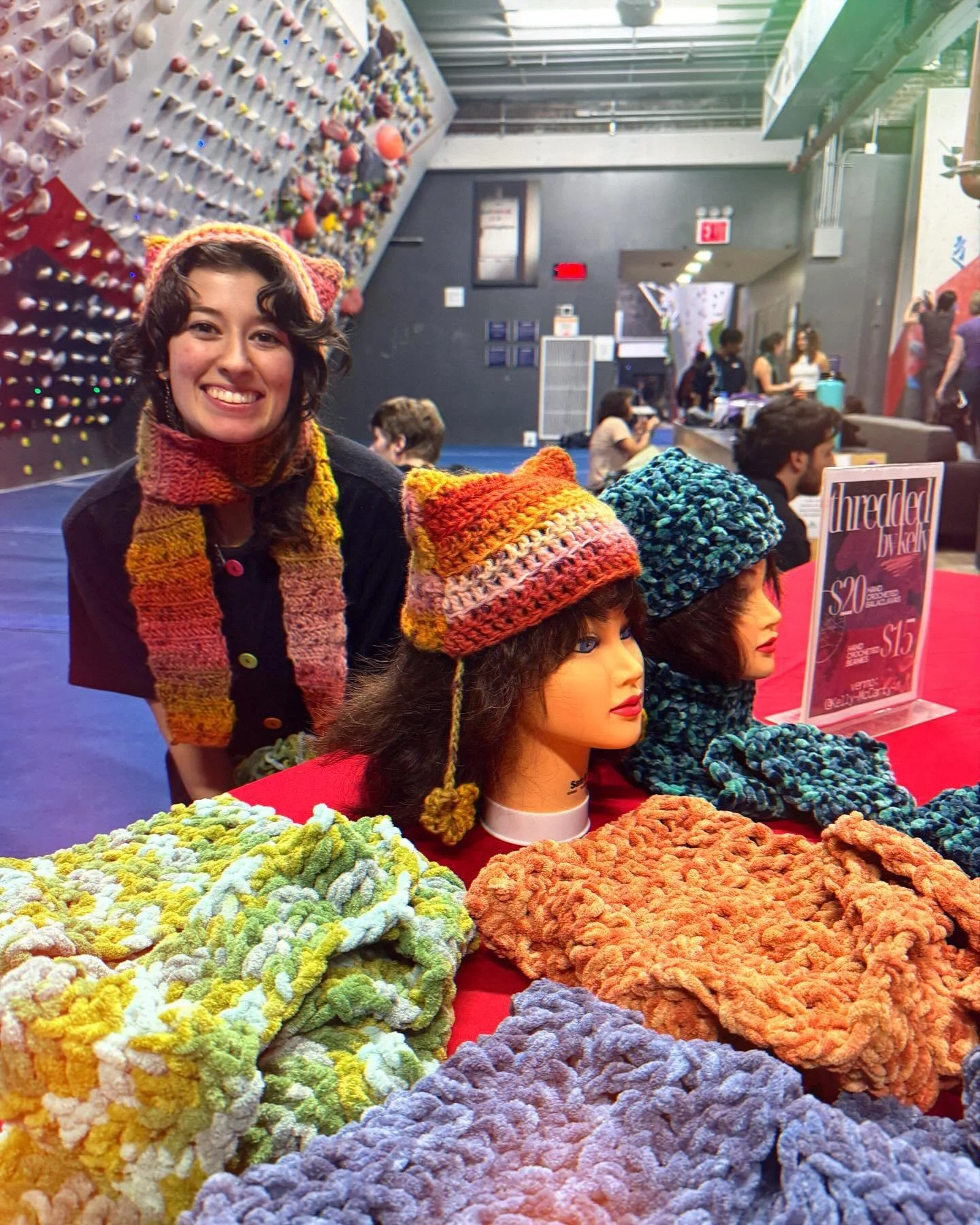 &bull;$25 Hooded Scarves &bull;scroll to 2nd page with video blue yarn/4th page with ombr&eacute; yarn&bull; (cat ears or no cat ears)

&bull;$15 Cat Ear Beanies &bull;1st page with pink&amp;orange yarn on mannequin/ 3rd page with video pink&amp;oran