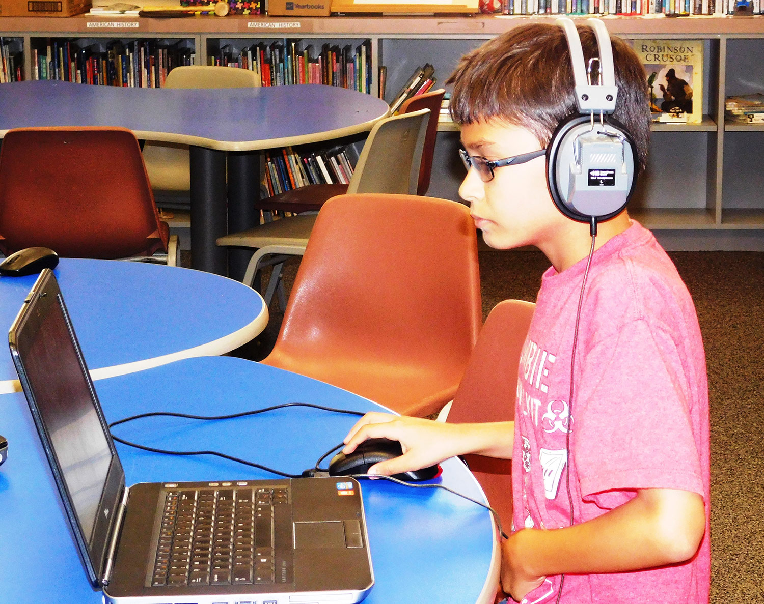 boy at laptop in headphones web.jpg