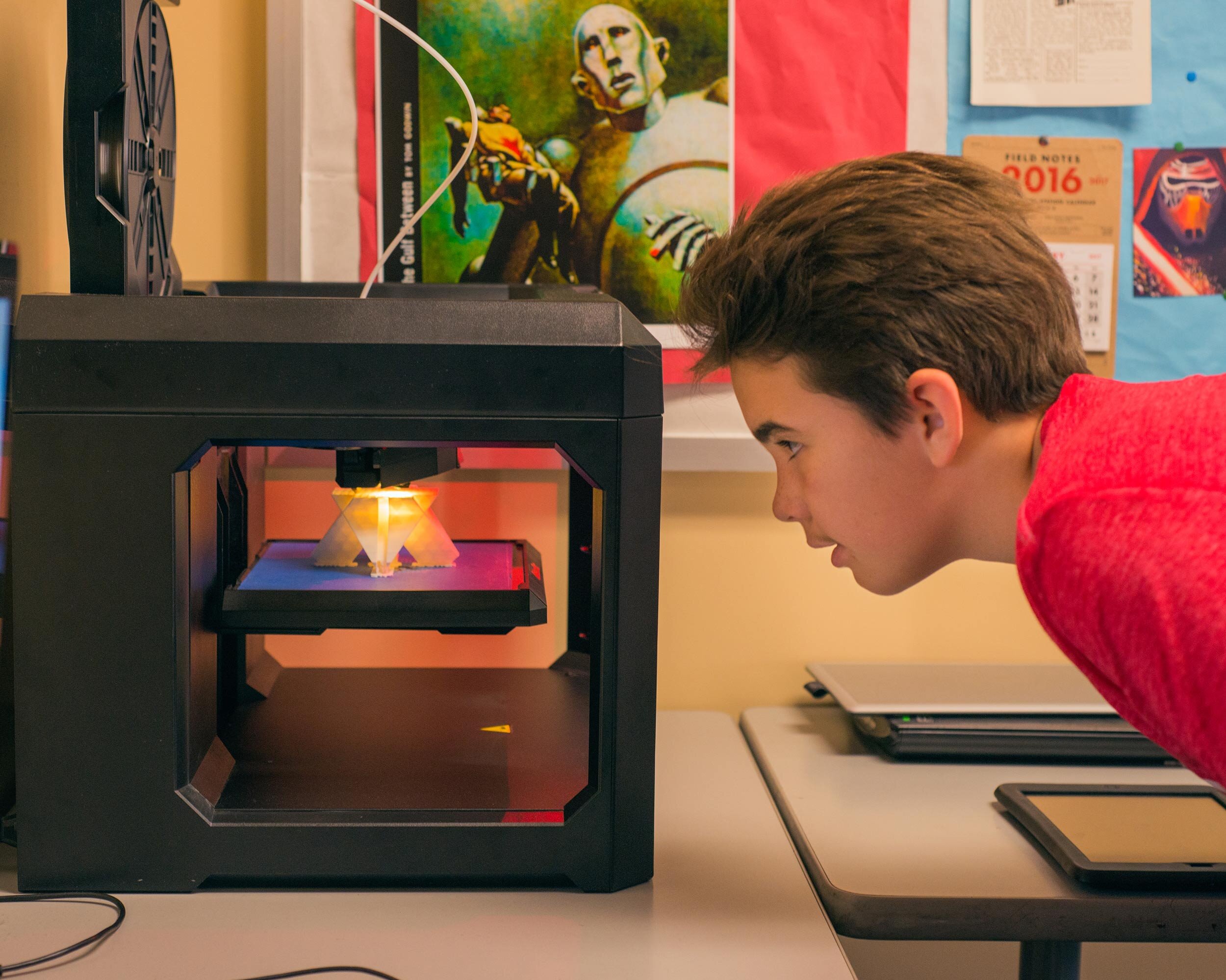 boy at 3d printer web.jpg