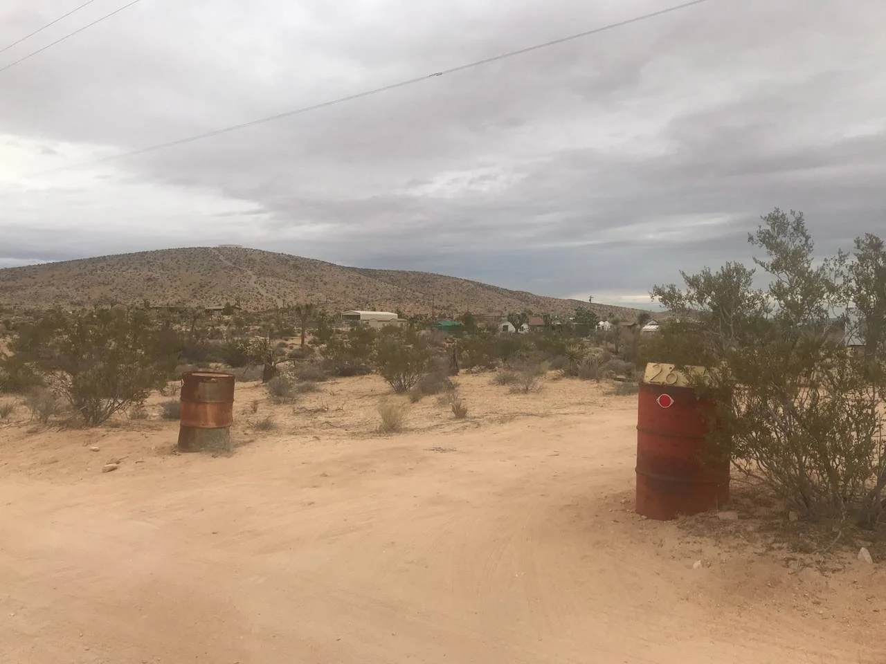 1. Driveway entrance from Yucca Mesa road, look for the two barrels. GPS should take you here.