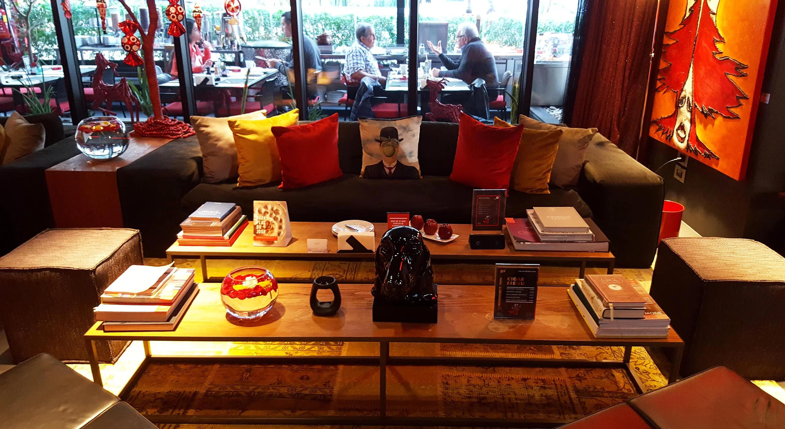The lounge area with the outdoor breakfast area behind it