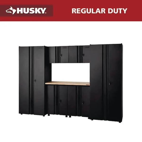 Husky 7 piece black welded steel garage storage system with lockers, base cabinets, wall cabinets, and solid wood work surface on sale for $1,500