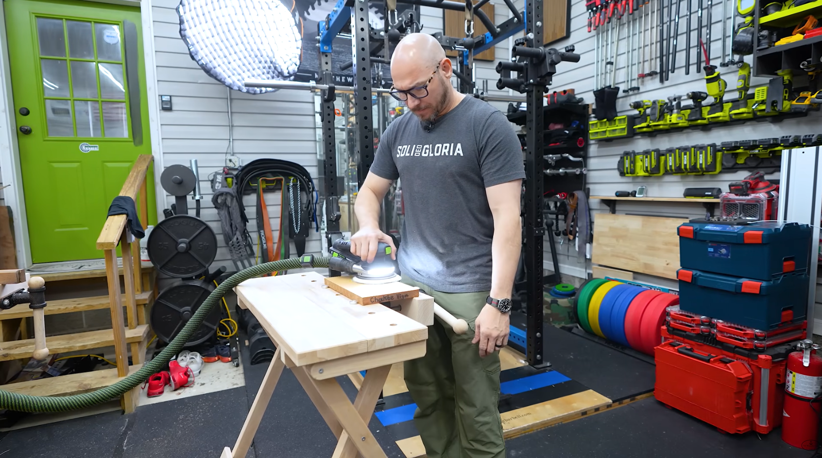 sanding with a Festool sander on a Pinie workbench
