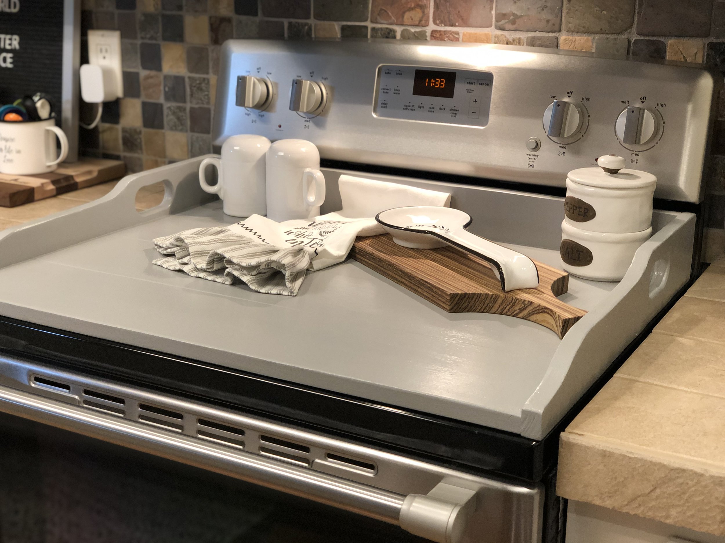 light gray stove cover.jpeg
