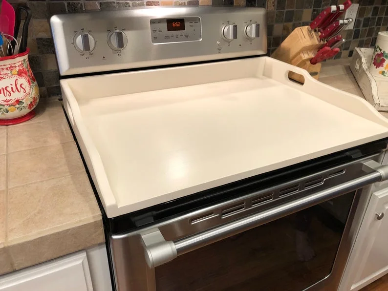 white electric stove cover.jpg
