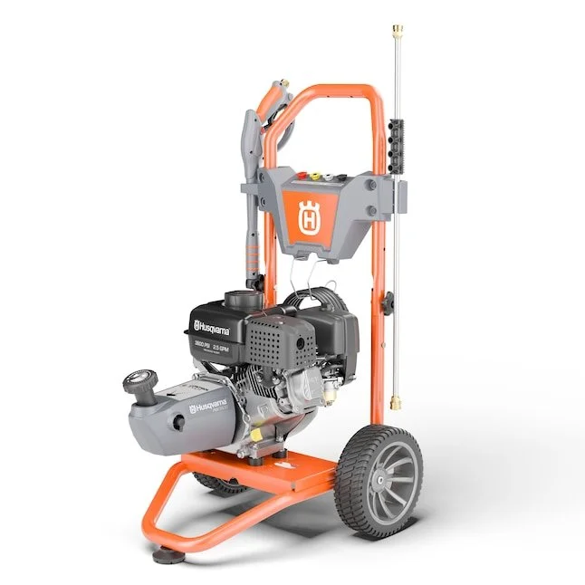 Selection of Husqvarna and Briggs & Stratton gas powered cold water pressure washers with spray tips and high pressure hoses.