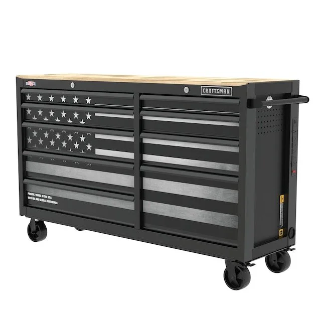 CRAFTSMAN rolling black and grey steel workbench with a solid wood butcher block top and soft close drawers on locking casters.