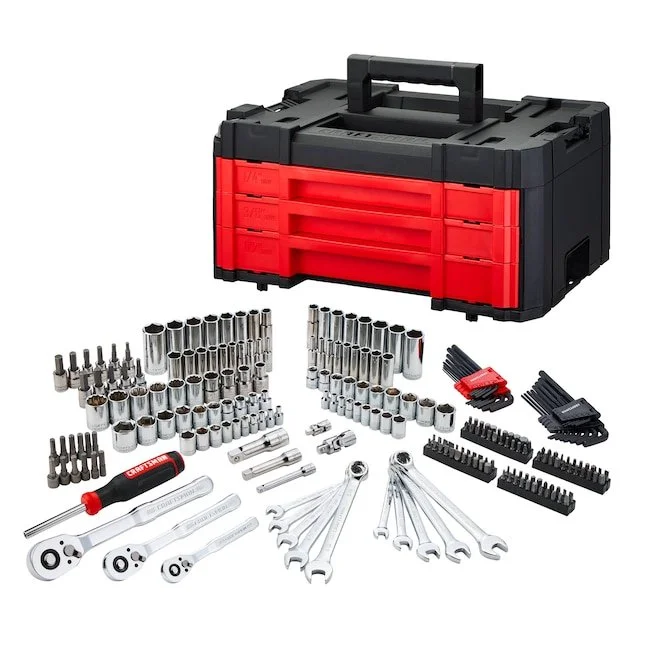 CRAFTSMAN VERSASTACK 242 piece metric and standard SAE mechanics tool set inside its black and red three drawer hard case tool box on a plain background.