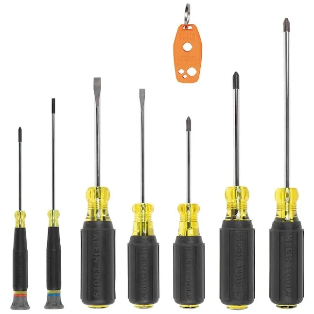 Klein Tools 8 piece all purpose screwdriver set with yellow and black cushion grip handles and various Phillips and slotted tips shown with a magnetizer tool.
