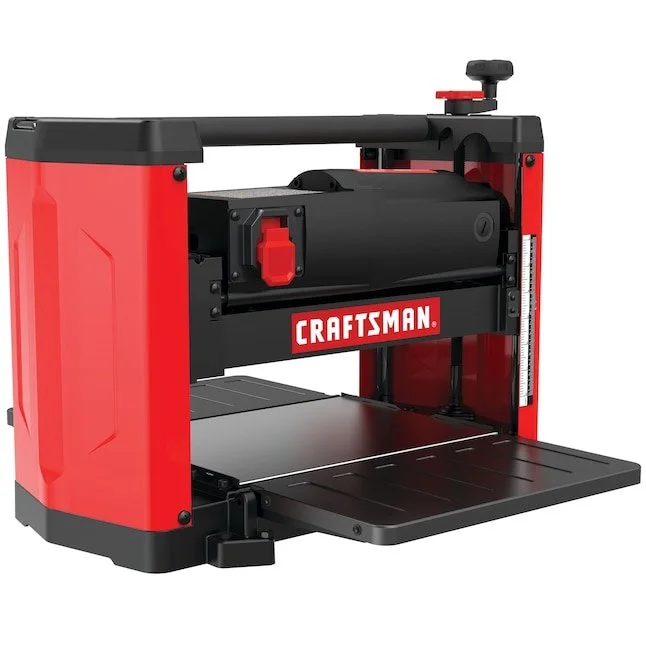 CRAFTSMAN 15 amp benchtop thickness planer with a 12.25 inch capacity resting on a workshop surface