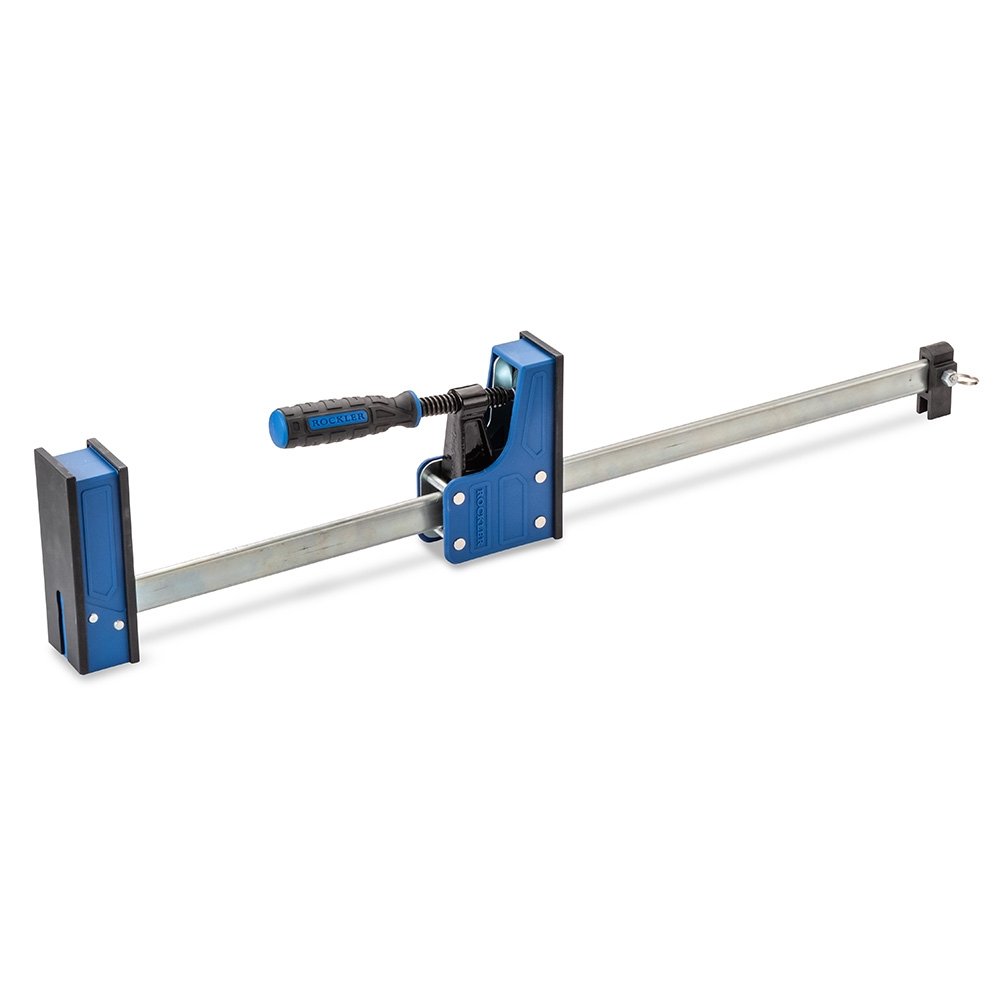 A pair of Rockler 24 inch parallel bar clamps with blue jaws and heavy duty steel bars for woodworking glue ups.