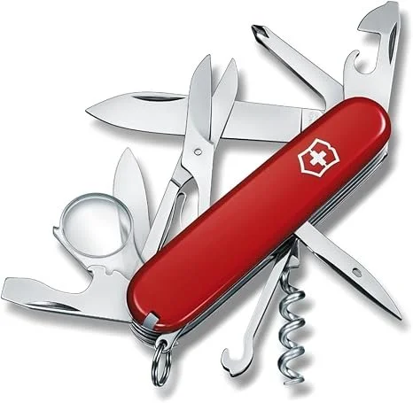 Victorinox Explorer Swiss Army Knife pocket tool in classic red showing the open blades, scissors, magnifying glass, and multi tool functions.