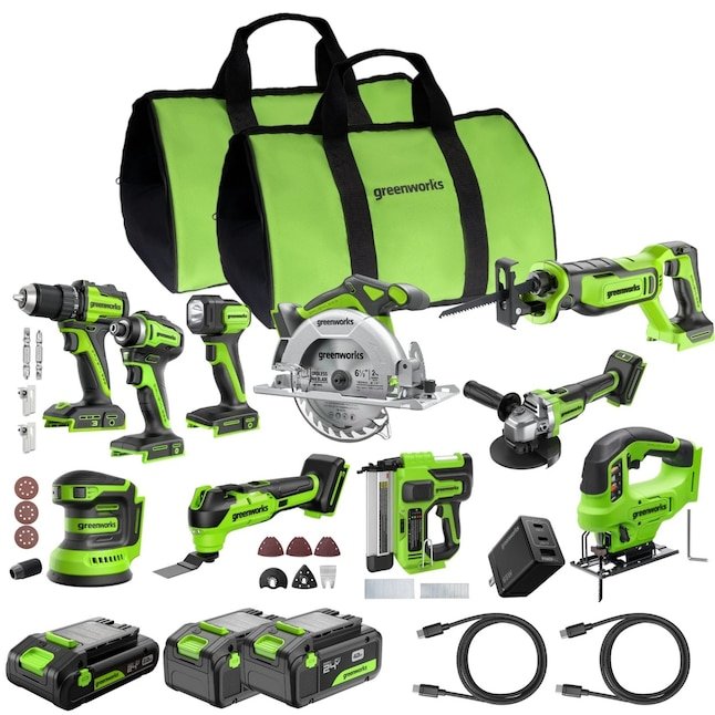A variety of Greenworks 24V brushless power tools including a drill impact driver and circular saw arranged with batteries and a USB C charger