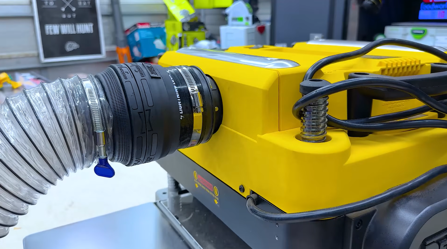 lightening lock being used on a dewalt planer for dust extraction