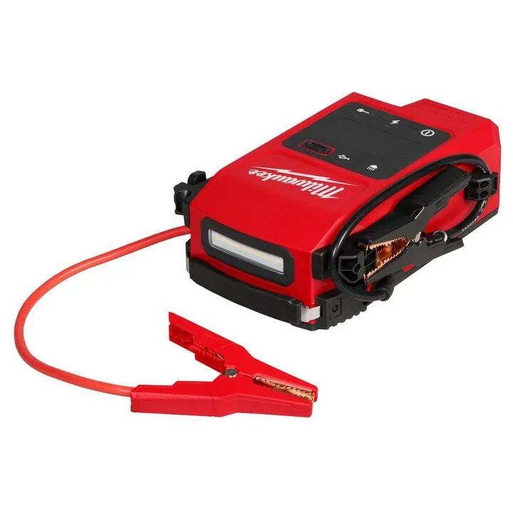Milwaukee M18 HOTSHOT Jump Starter tool with heavy duty clamps and digital display showing voltage.