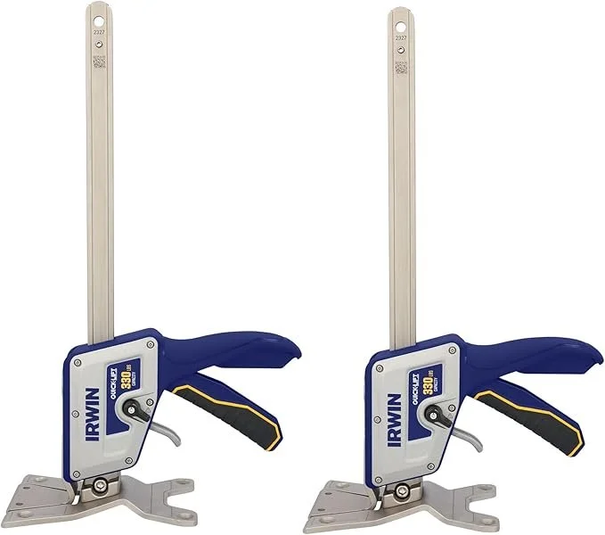 Two IRWIN Quick Lift construction jacks standing upright showing the slim base and 10 inch lift bars.