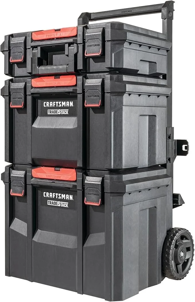 Craftsman TRADESTACK rolling tower tool box system loaded with tools in a garage workshop setting