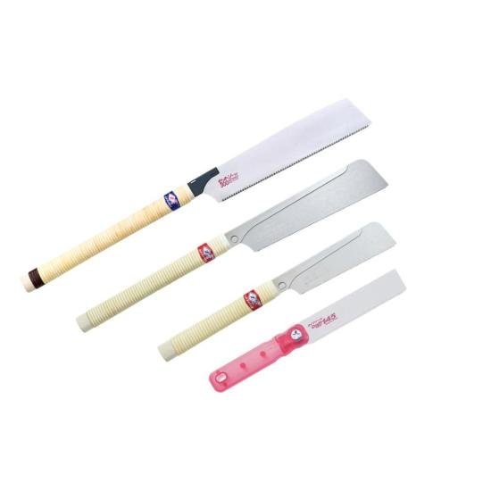 A collection of professional Japanese ZetSaw hand saws including Dozuki, Kataba, and flush cut models with traditional wooden handles.