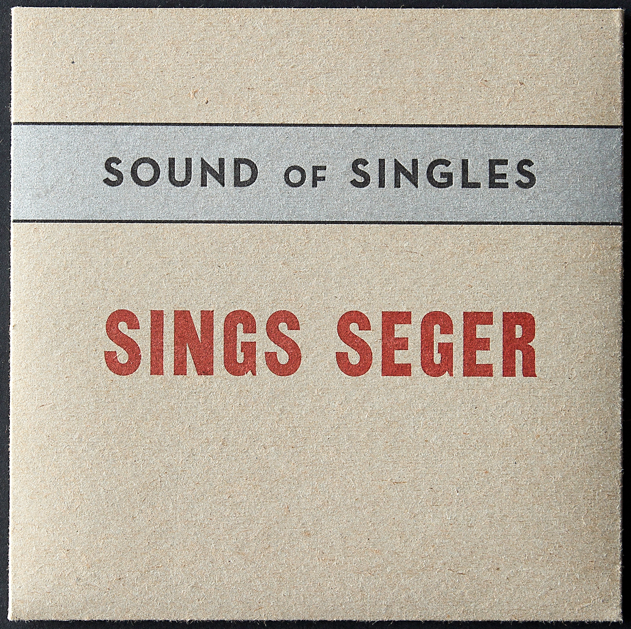  7 inch record. Front cover. Letterpress printed in three colors on 18pt chipboard. 