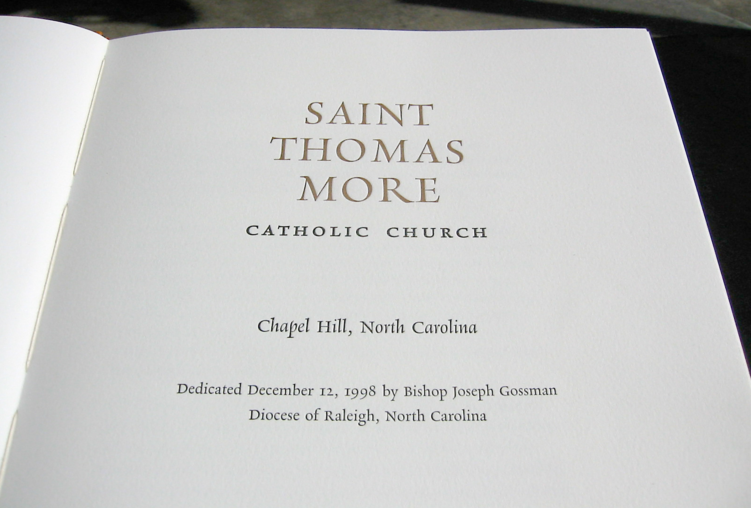  Title page for book that celebrated donors’ gifts and provides a history of the church’s founding. 