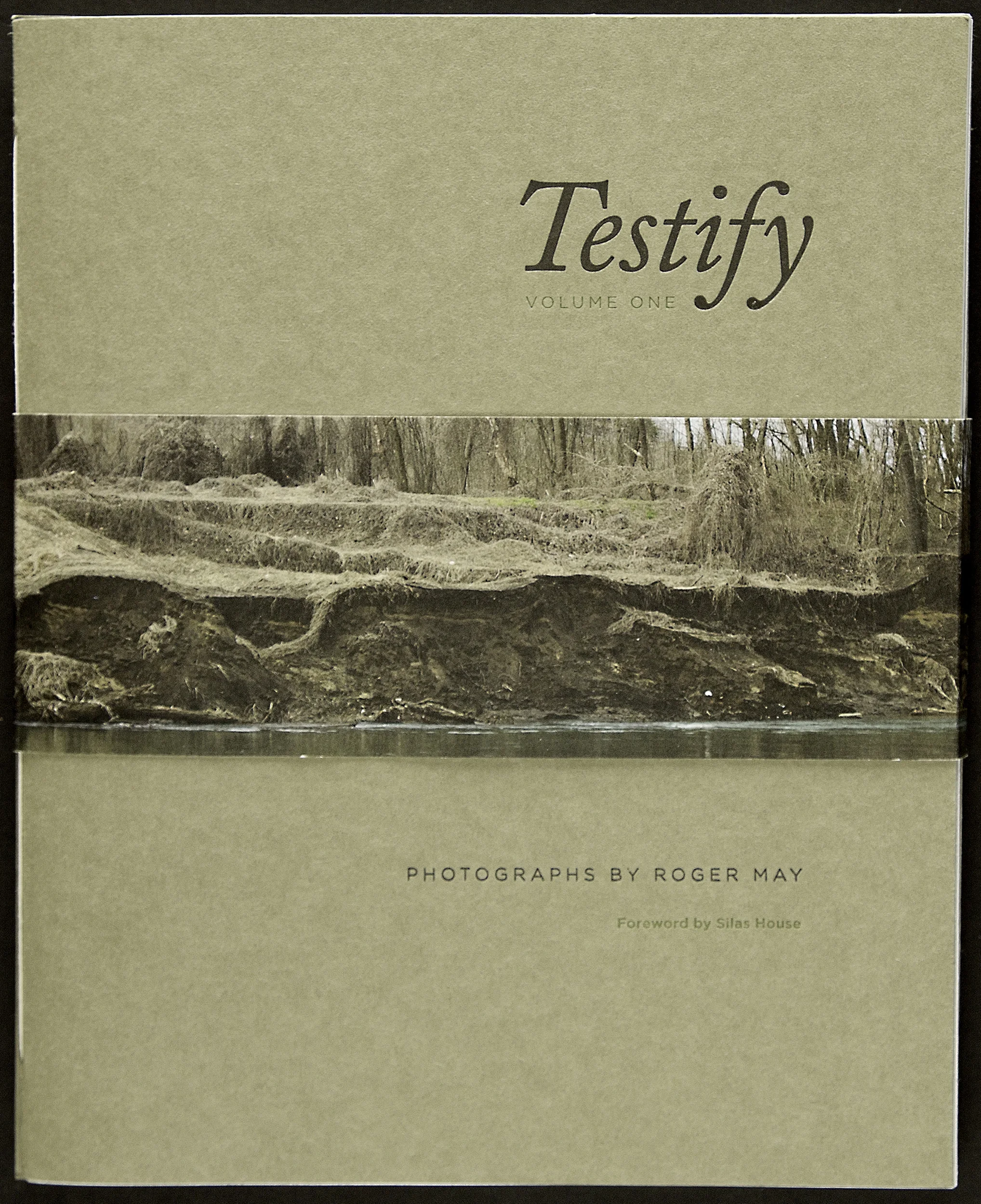 A printed bellyband holds the two volumes of this poetry collection together. The image is of the Tug River which separates West Virginia from Kentucky, the two states where Roger made the photographs in this collection.