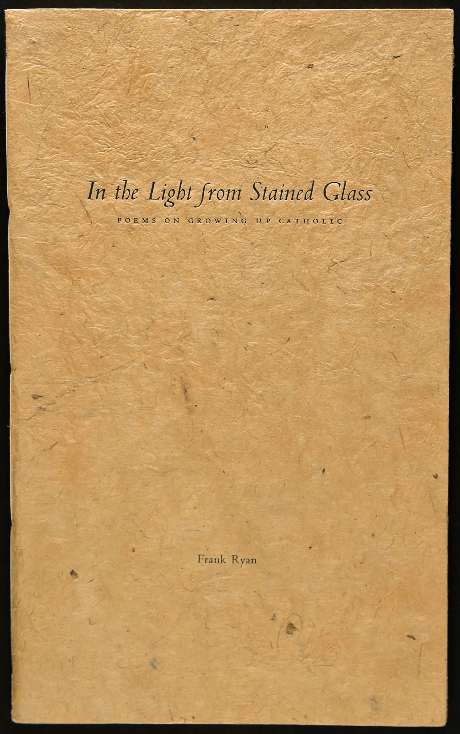 Poetry title letterpress printed on lotka fiber paper. Frank Ryan had several books published during his career and this hand-printed title was commissioned by his daughter as a retirement present for her father. All three of us worked together to decide which poems should be included and how they were sequenced.