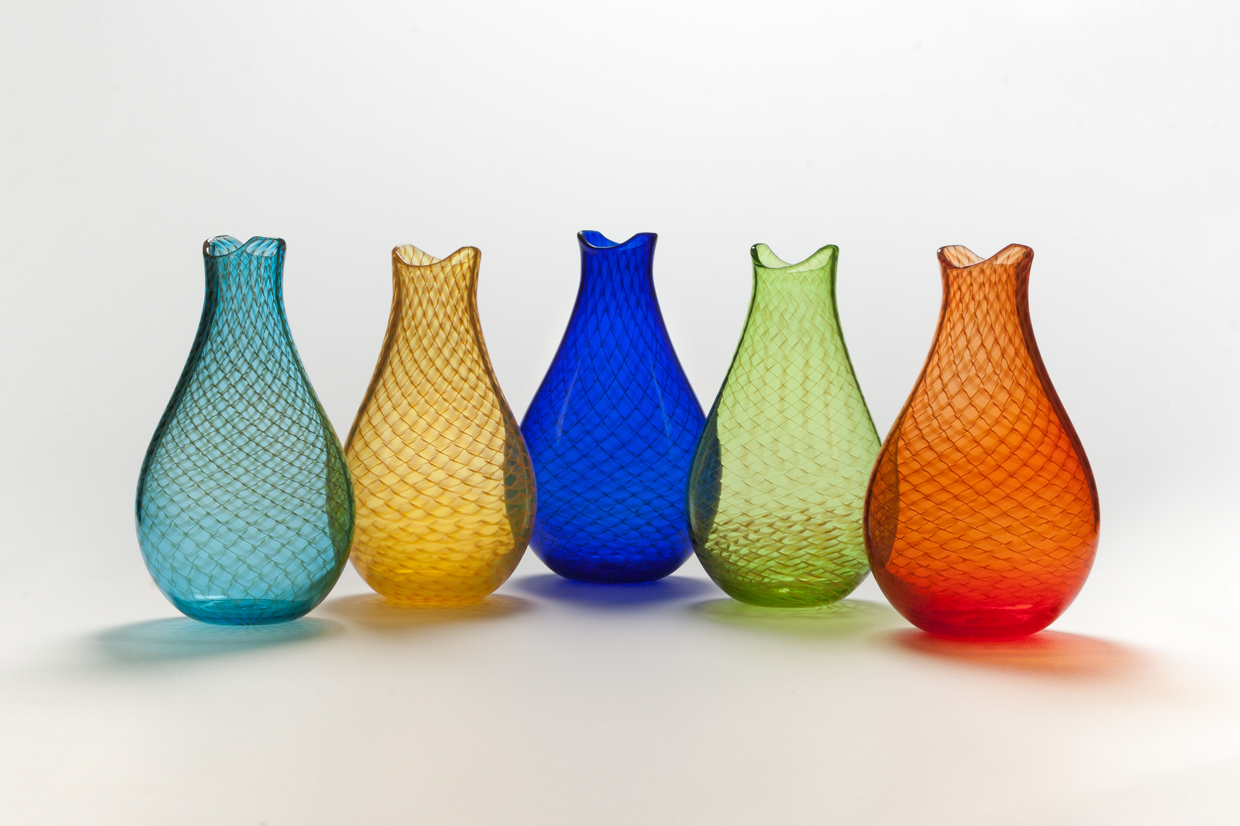 ‘Fishnet’ vases by John Geci. John lives and works around the corner from Penland and we have vases and bowls in a variety of sizes and styles, tumblers, bourbon glasses, flasks, and decanters.