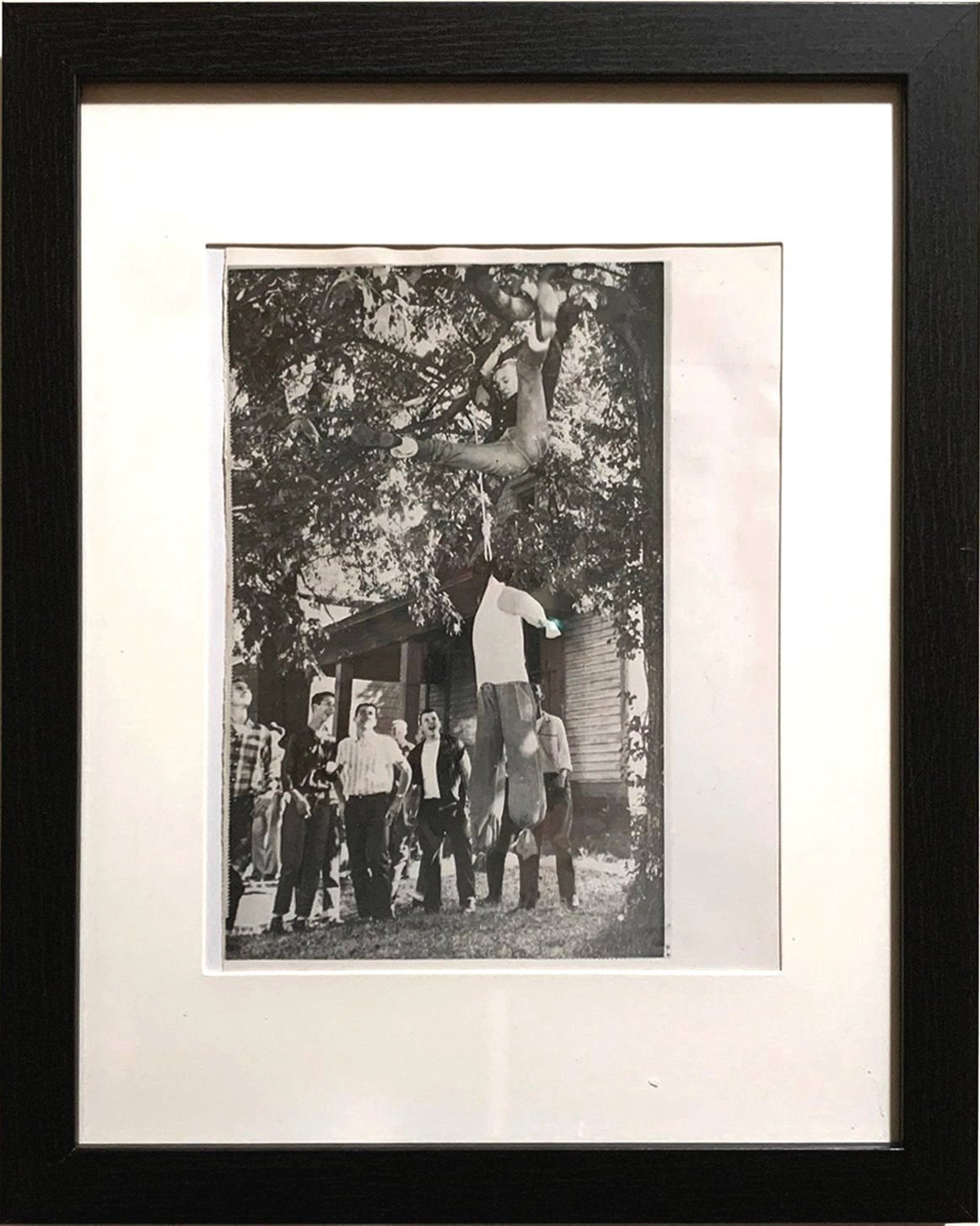 SOLD - 2. 10/4/57 – Black effigy hung in tree by Central High School students during the Central High School Crisis. (Note boy in mid-air jumping out of tree after hanging it) Little Rock, Arkansas