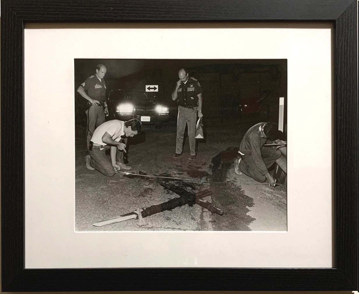 9. 9/6/1988 –Deputies and fire inspectors examine scene of cross burning Monday. Spokane, Washington