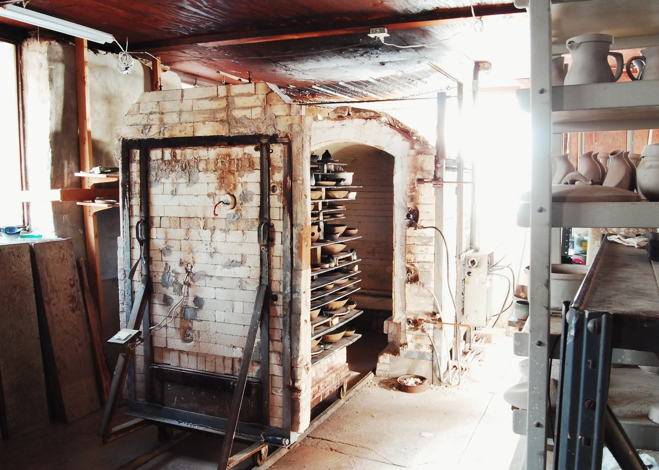 After a full day of cooling, the kiln can be opened and the magic of the process is revealed.