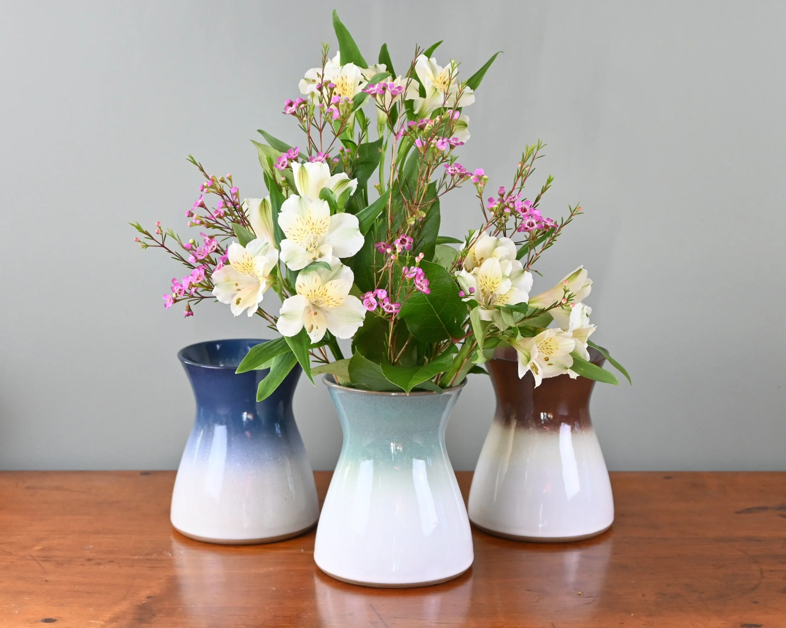 home utensil vase flowers.JPG