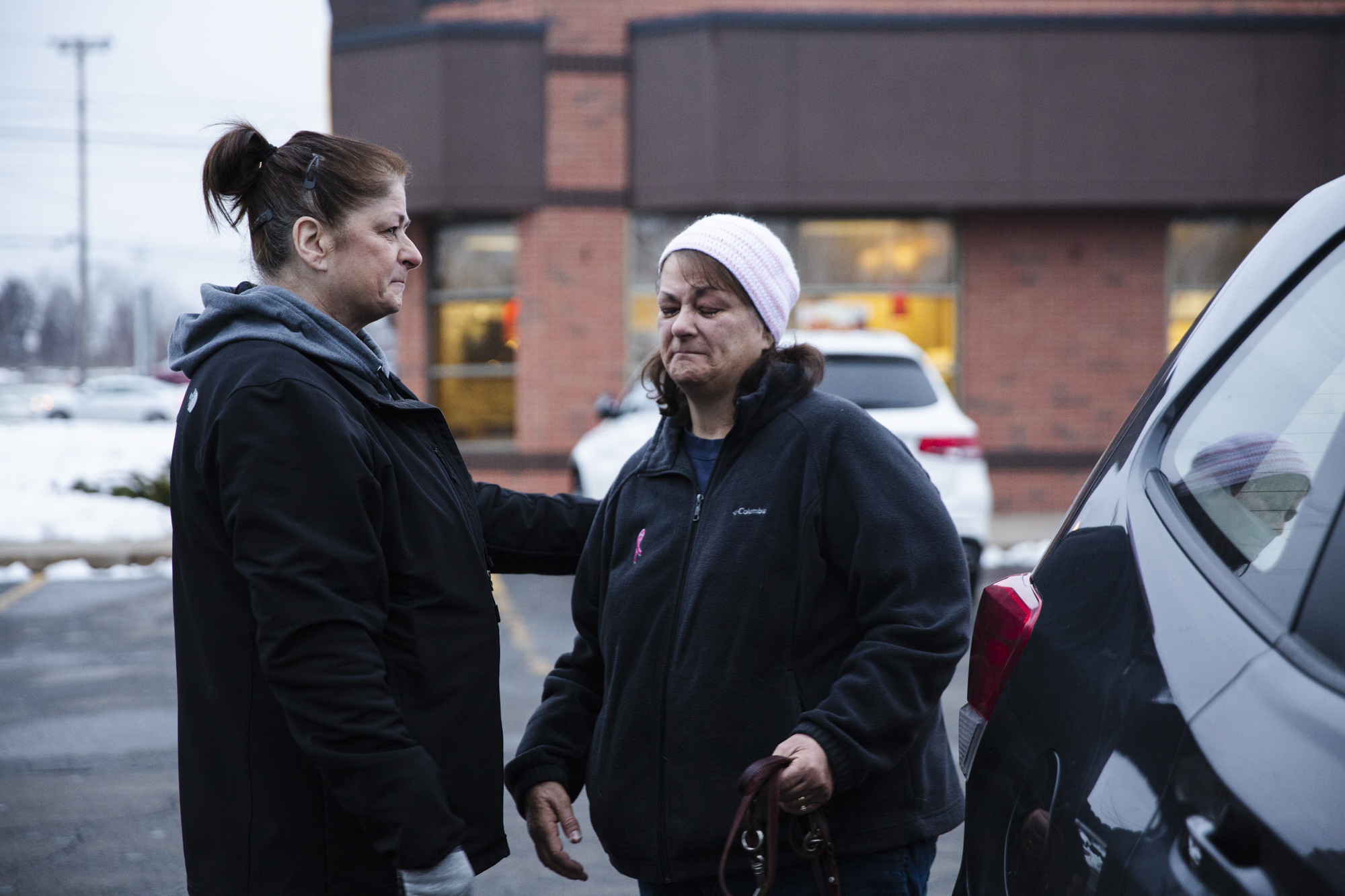  Cindy (right) and her sister (left) after saying goodbye to Brody in a Tim Horton's parking lot outside Rochester, NY, Dec 1, 2018. Cindy won't raise another dog for Guiding Eyes as her cancer, which had been in remission, has returned. Cindy had fe