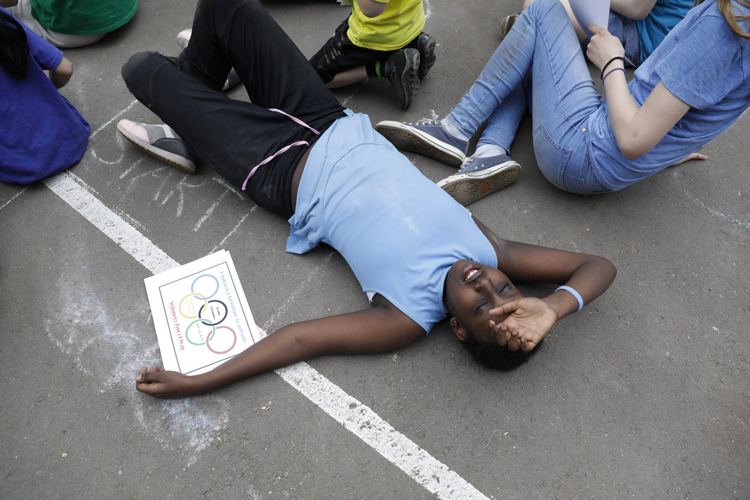  Deborah Gwapor rests after Elementary Field Day at Hinkson Christian Academy in Moscow, Russia May 27, 2019. 