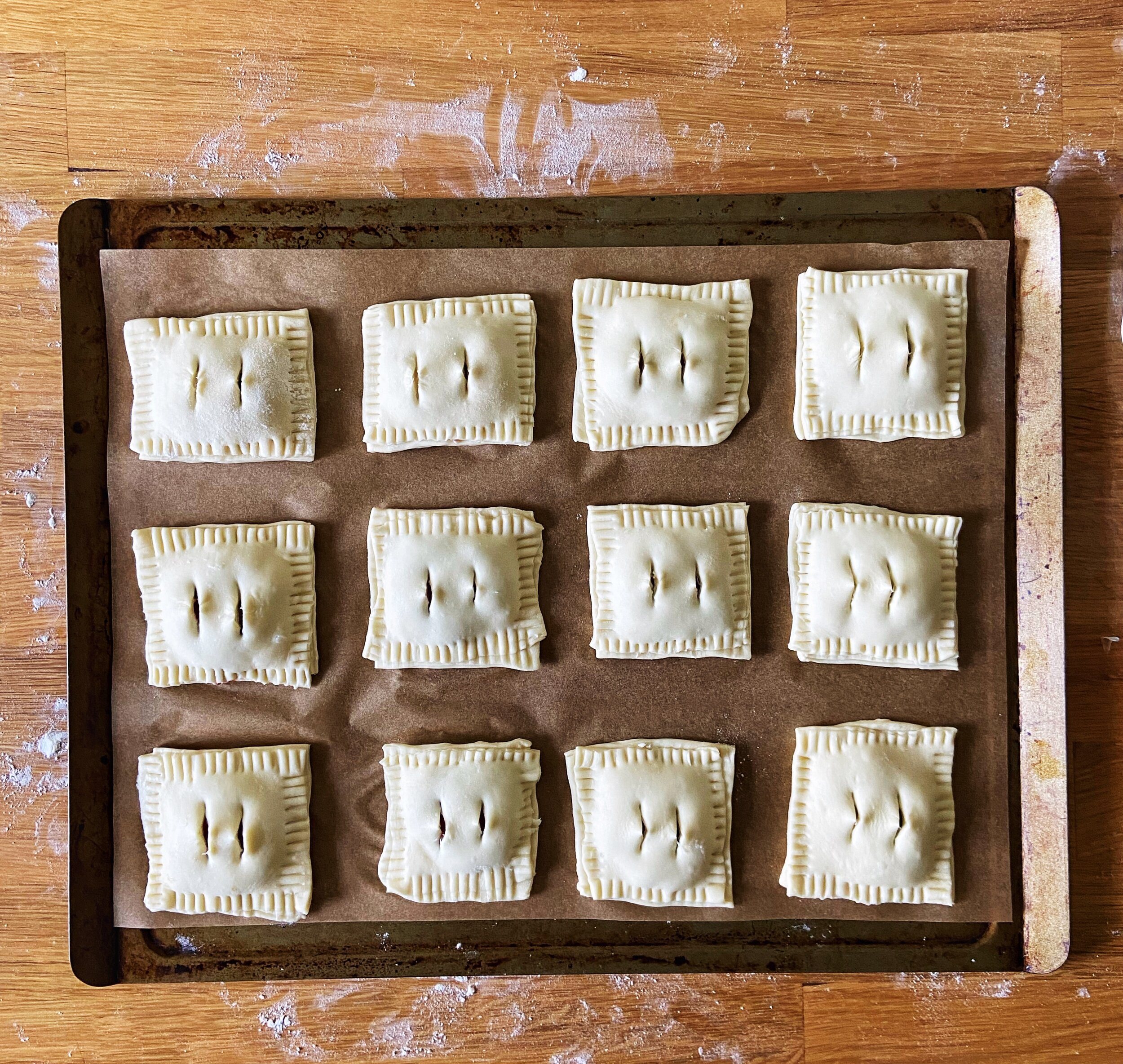 seal edges with a fork and cut holes in the top