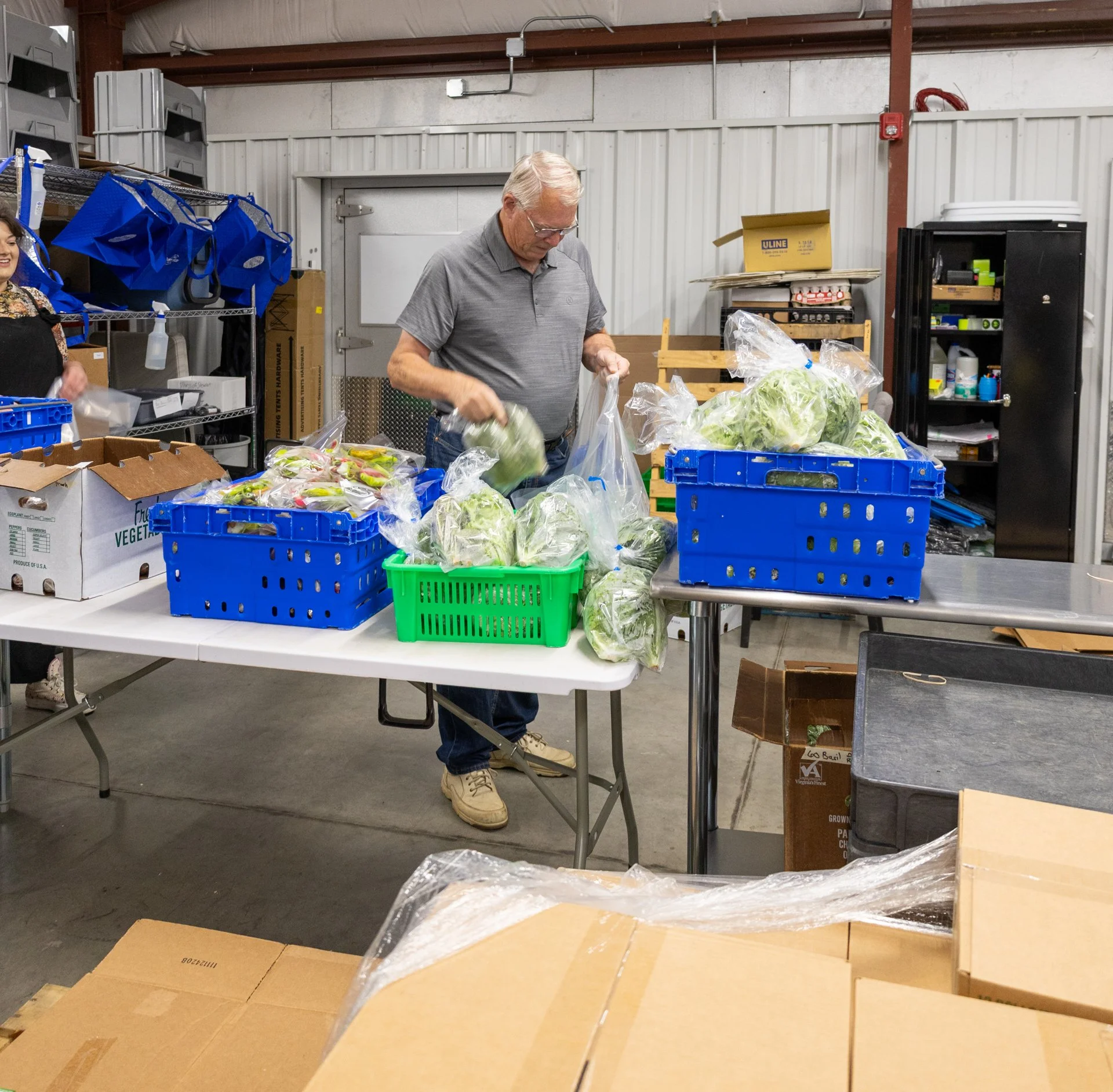 Jim packing produce boxes-19.jpg