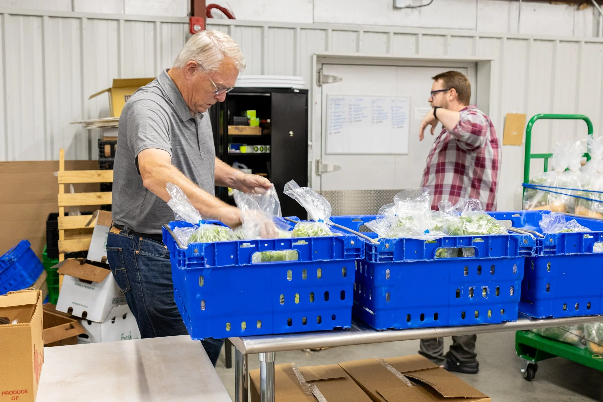 Jim packing produce boxes-12.jpg
