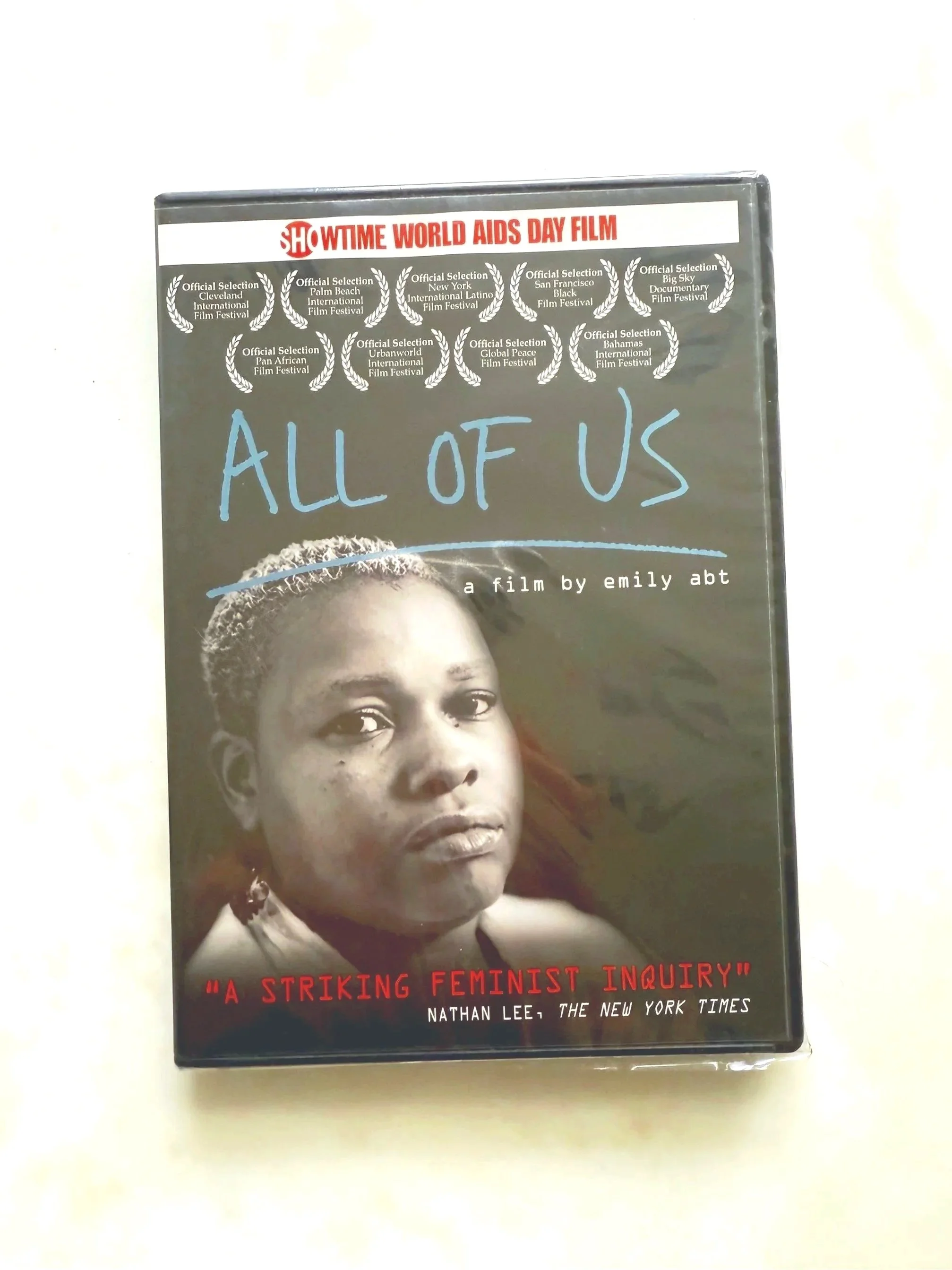"All of Us" DVD featuring Deleted Scenes, Interview with Director & Behind-the-Scenes Stills. Home use only.