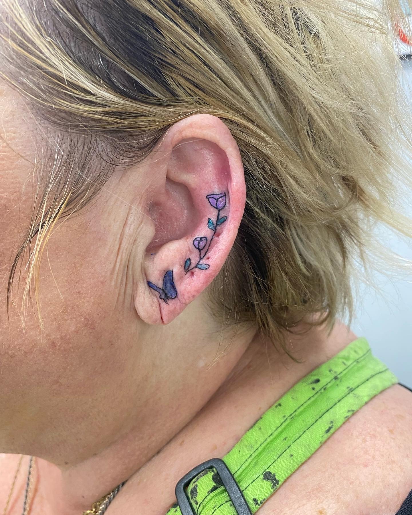 butterfly and floral along ear.jpeg