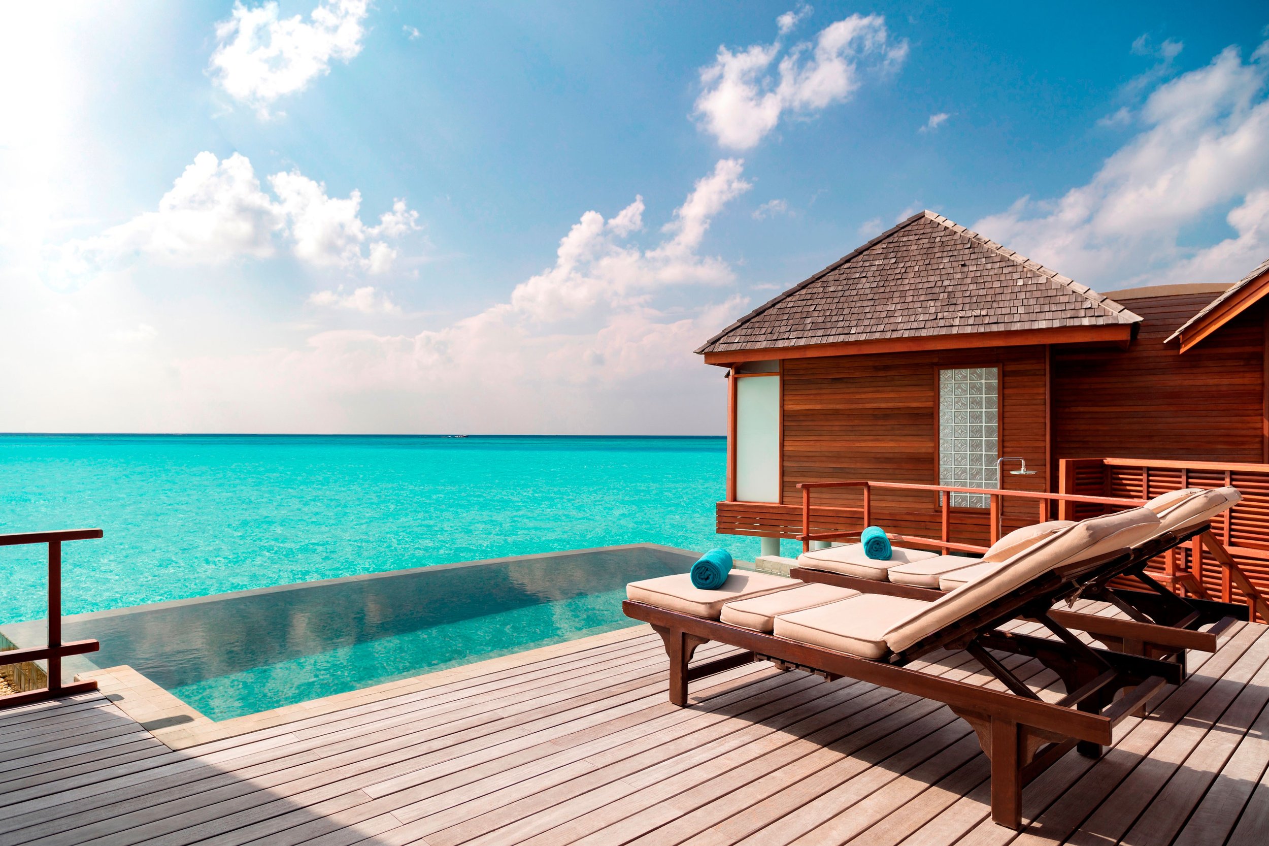 Anantara_Dhigu_Over_Water_Pool_Suite_Deck.jpg